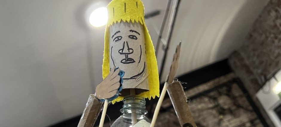 Rod puppet made from cardboard, fabric and a plastic bottle at a PVTV Creative Meet-Up